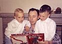 Chet Gilbert reading to sons Mike and Gordy